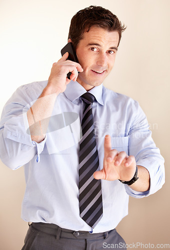 Image of Phone call, portrait and business man stop, pause or wait gesture for consultation interruption, discussion and talking with contact. Hand sign, cellphone and agent negotiation, conversation or chat