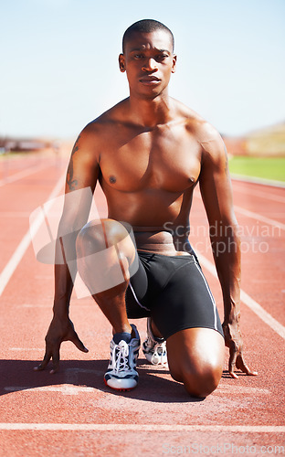 Image of Man, runner and starting line for sprint, ready and sport or marathon, olympics and race or competition. Black male person, training and exercising or active, practice and face for fitness or workout