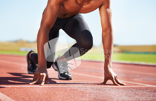 Image of Man, runner and starting line for sprint, athlete and training for marathon, olympics and race or competition. Black male person, ready and exercising or outdoors, practice and workout or fitness