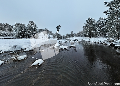 Image of Amazing Cinematic Aerial View On Freezing River. Aerial View Flight Above Frozen Creek Scenic View Of Nature