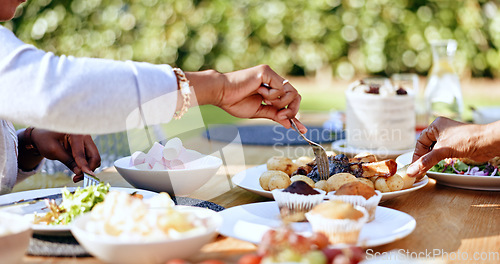 Image of Hands, food and table for sharing and eating, family together or dinner or social gathering meal at home. Gratitude, love and kindness in bonding on holidays, buffet and for health diet in wellness