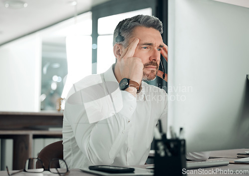 Image of Call center, confused man and stress at computer for customer account problem, 404 error or telecom glitch in office. Headache, tired and mature telemarketing agent thinking of online challenge at pc