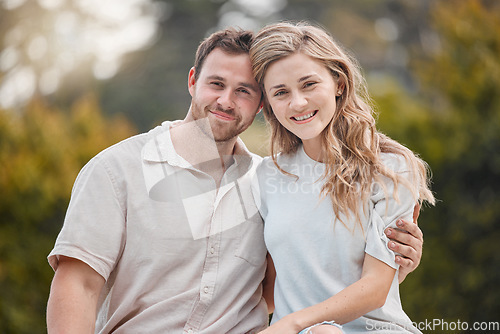 Image of Happy couple, smile and embrace with portrait in garden, backyard or outdoors with hug for love. Man, woman and excitement on face for bond, care and support for romance, marriage or relationship