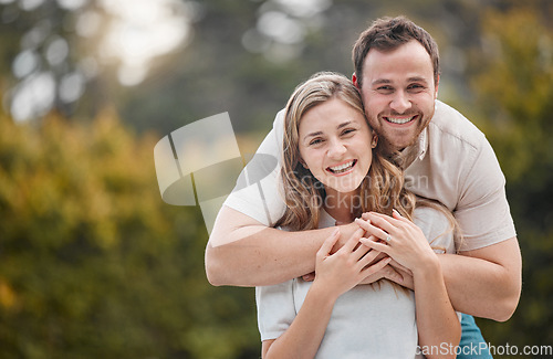 Image of Happy couple, hug or embrace with portrait in backyard, garden or outside with love, care and support for bond. Man, woman and smile with excited expression for marriage, romance and relationship