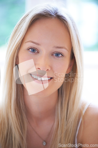 Image of Woman, smile and portrait closeup in morning, home and apartment window with beauty or skincare. Positive, face and person in house to relax in living room with positivity, happiness or wellness