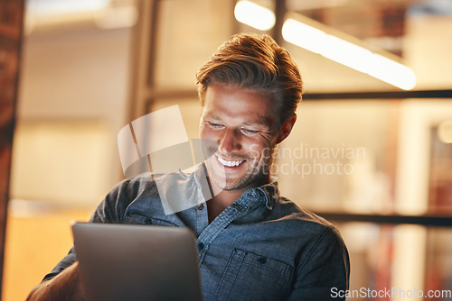 Image of Night, business and man with a tablet, smile and employee with connection, project and communication. Person, evening and entrepreneur with technology, email notification and internet with research