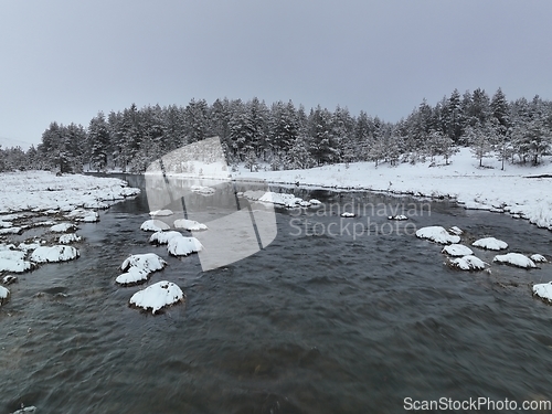 Image of Amazing Cinematic Aerial View On Freezing River. Aerial View Flight Above Frozen Creek Scenic View Of Nature