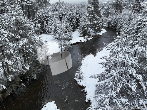 Image of Amazing Cinematic Aerial View On Freezing River. Aerial View Flight Above Frozen Creek Scenic View Of Nature