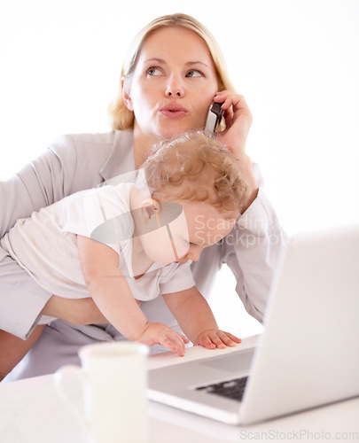 Image of Businesswoman, phone call and baby with laptop in home for remote work, multitasking or productivity. Single mom, childcare and alone with busy toddler with stress for technology, career or job