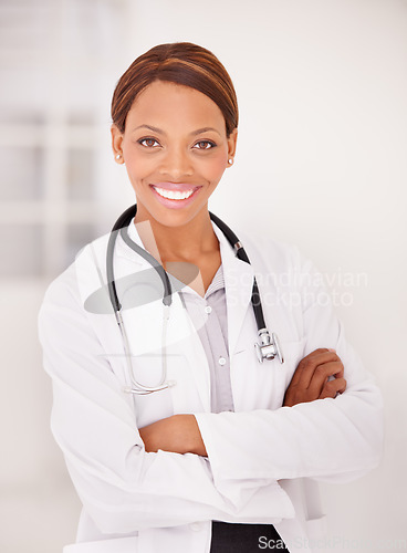 Image of Doctor, woman portrait and arms crossed for professional career, happy services and confidence in clinic or hospital. Smile of african expert or medical worker with healthcare solution and integrity