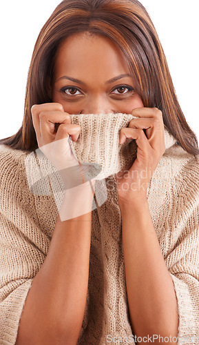 Image of Shy, black woman and sweater with portrait, funny and girl isolated on a white studio background. Face, African person and model with winter clothing, cover and playful with emotion, goofy and silly