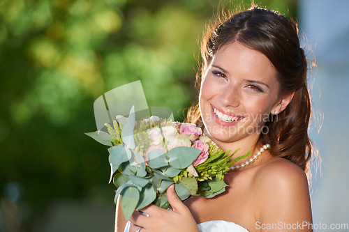 Image of Woman, portrait and wedding rose bouquet with love, commitment and trust ceremony for marriage. Happy, celebration and flowers for event in a park with a floral plant and bride dress outdoor