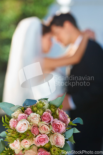 Image of Flower, bouquet and couple with hug at wedding for love, smile and commitment at garden reception. Roses, happy woman and man embrace at marriage celebration event, partnership or future together