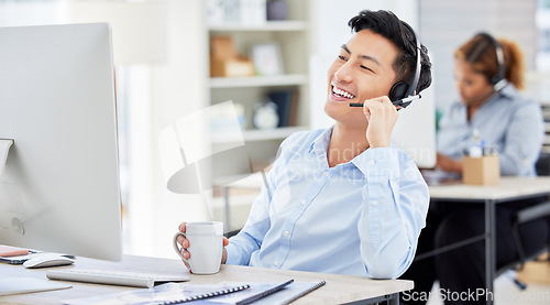 Image of Man, call centre and talking on headset for phone call customer service, computer for telemarketing. Asian person, support and communication employee as agent for internet sales, care at help desk