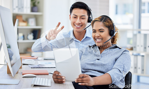 Image of Call center, man and woman with selfie, smile or peace sign for teamwork and customer service in office. Telemarketing, people and employees or agents with tablet for social media profile picture