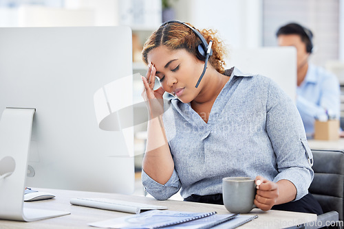 Image of Woman, call center and headache or stress, frustrated and burnout or crisis, tired and fatigue for fail. Black female agent, migraine and exhausted at work, depression and anxiety or drinking coffee
