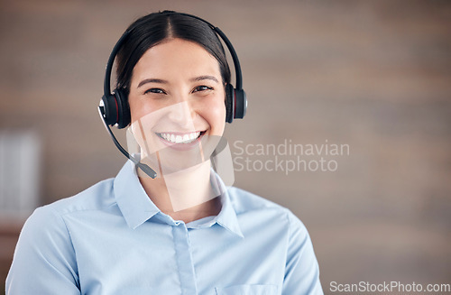 Image of Portrait, woman and smile in call center for telemarketing, customer service and advisory contact, CRM help and FAQ support. Face, microphone and happy telecom consultant for sales, IT and questions
