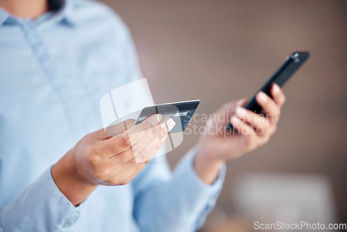 Image of Business woman, hands and phone with credit card for payment, online banking or ecommerce at office. Closeup of female person with debit on mobile smartphone for fintech purchase, shopping or buying