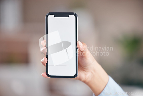 Image of Woman, phone and hand with mockup screen for advertising, social media or marketing at office. Closeup of female person or employee showing mobile smartphone display, copy space or app at workplace