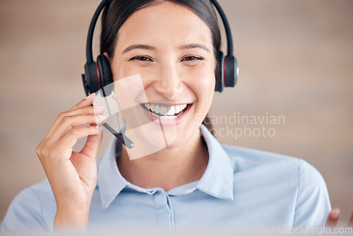 Image of Call center, woman and smile for online customer service, CRM contact or telemarketing advice. Happy telecom consultant, microphone or communication at help desk in sales, IT questions or FAQ support