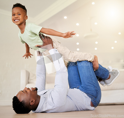 Image of Dad, child and airplane play on floor, fun and bonding in childhood, love and smile for freedom. Happy, father and son at home, flying and portrait or support, joy and excited for fantasy game