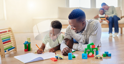 Image of Family, man and boy with book for learning in home for child growth, development or milestone. Black person, kid and together for toys by education, teaching or motor skill by lying, floor and lounge