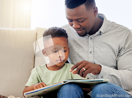 Image of African, father and child in home reading book on sofa with development of education, learning and knowledge. Happy dad, teaching and show kid a story in books and relax in living room on couch