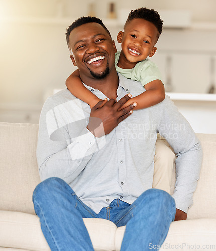 Image of Dad, son or hug on sofa in portrait, love or happy family with wellness in living room. Black people, man and child together with smile face, care bonding and weekend with gratitude support in house