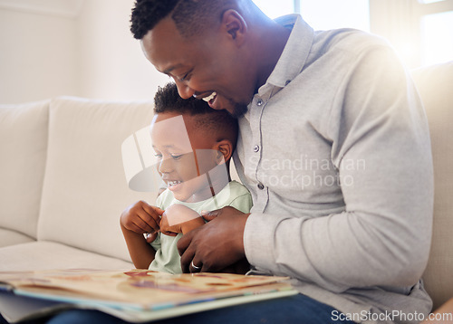 Image of African, father and child in home reading book on sofa with development of language, education and learning. Happy dad, teaching and show kid a storytelling in books and relax in living room on couch