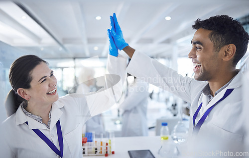 Image of Science, high five and man with woman in laboratory for agreement, success or deal. Teamwork, medical research and celebration, scientist partnership in collaboration or congratulations for doctors