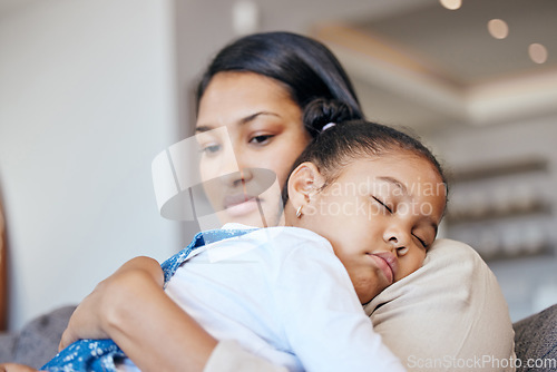 Image of Mother, daughter or sleeping on couch with worry, fatigue or comfort in mental health in home. Little girl, woman and relax on sofa with tired child, care support and wellness with thinking in house