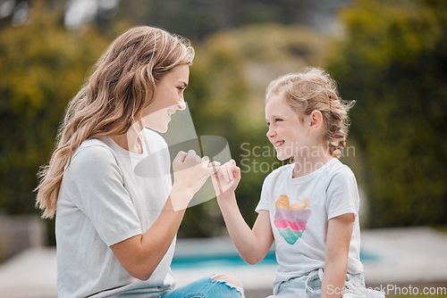 Image of Outdoor, swear and mother with girl, pinky promise and relax with happiness, bonding or commitment link. Family, mama or kid with hand gesture, support or love in a park, secret or nature with trust