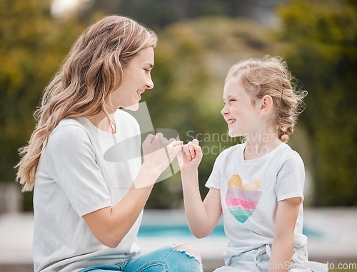Image of Smile, swear and mother with girl, promise and relax with happiness, bonding and commitment link. Family, mama and child with hand gesture, pinky and love in a park, secret and support with trust