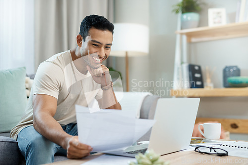 Image of Happy man, bills and thinking on laptop and sofa for planning finance, reading website and taxes management. Young person with documents for home budget, solution and insurance choice on his computer