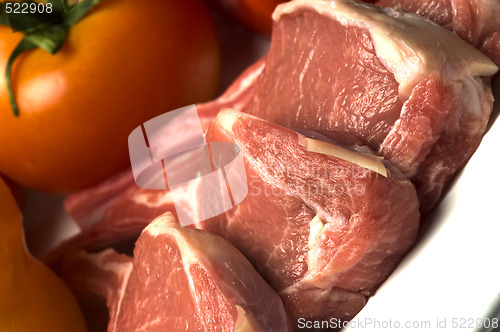 Image of rib lamb chops with vegetables tomato