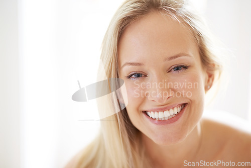 Image of Happy woman, dermatology and portrait for closeup in home for skincare, beauty and cosmetics. Person, hair and face with excitement for treatment of texture, anti aging or smile with vitamin c