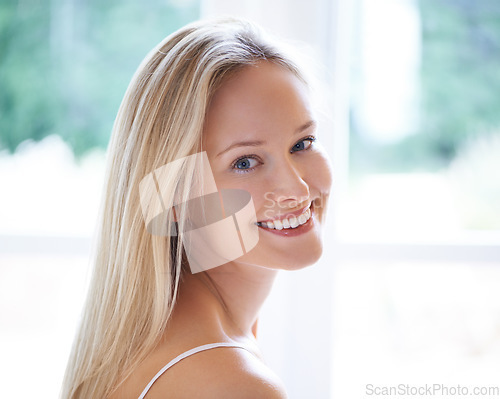 Image of Portrait, happy woman and smile for skincare in home with closeup for beauty in dermatology. Person, face or excited for anti aging, treatment or skin with vitamin c, hyaluronic acid and spf for glow