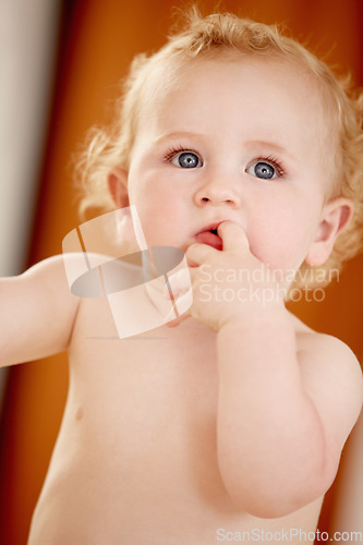 Image of Home, baby on the floor and happy with joy, bare and calm in the living room, child development and learning to crawl. Apartment, infant on the ground and person in a lounge, support and playing