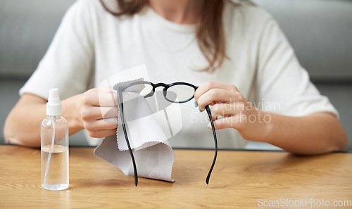 Image of Woman, hands and clean glasses from dirt or seeing health, microfiber cloth for lenses. Female person, wipe frame and spectacles for bacteria for clear vision with tissue for reading, safety for eyes