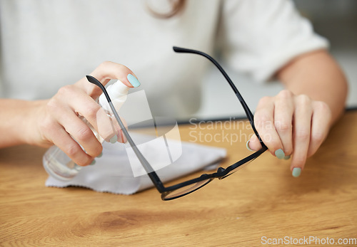 Image of Woman, hands and clean glasses for wipe seeing health, microfiber cloth for lenses. Female person, dirt frame and spectacles for bacteria and clear vision with tissue for reading, safety for eyes