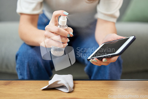 Image of Woman, hand and clean cellphone screen or hygiene wipe bacteria, dust wellness or health safety. Female person, mobile device and cloth for germs or surface sanitizer, protection disinfectant or dirt