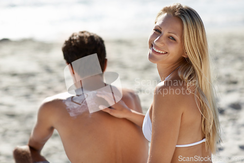 Image of Beach, happy couple or apply sunscreen heat on vacation, holiday or weekend trip travel together. Love, uv protection or suncream application for summer skin safety, solar security or SPF sunblock.