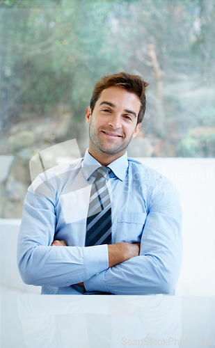 Image of Business man, portrait and arms crossed for career leadership, happy with job and confidence at table or desk. Face of mature and professional person or boss in POV meeting or consultation at office