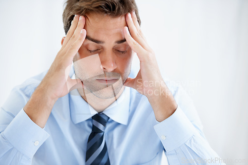 Image of Business man, headache and stress or angry for bankruptcy, stock market crash or financial fail in office, wall or white background. Tired or frustrated person or mature boss with debt and job crisis