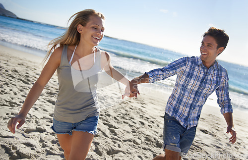 Image of Couple, walk and smile by ocean, holding hands or outdoor in summer sunshine for vacation, thinking or travel. Man, woman and care for love, bonding or holiday at beach for adventure in Naples, Italy