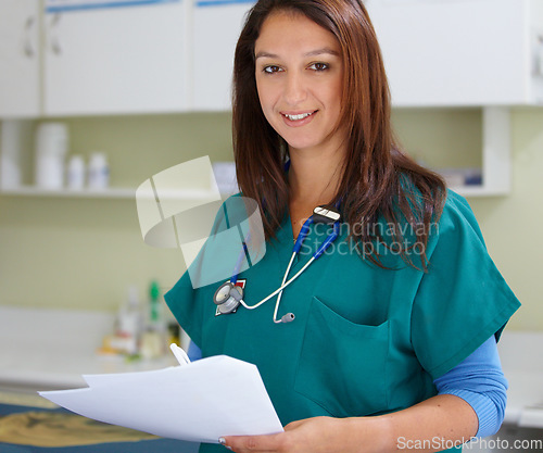 Image of Veterinary portrait, clinic paperwork and happy woman with test results, assessment notes or healthcare documents. Pet healing services, happiness and hospital veterinarian smile for vet feedback