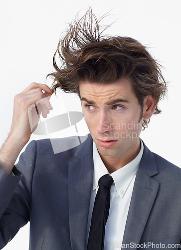 Image of Chaos, crazy hair and business man with doubt and confused from stress and anxiety. Studio, male professional and working with corporate job and thinking with wild hairstyle and white background