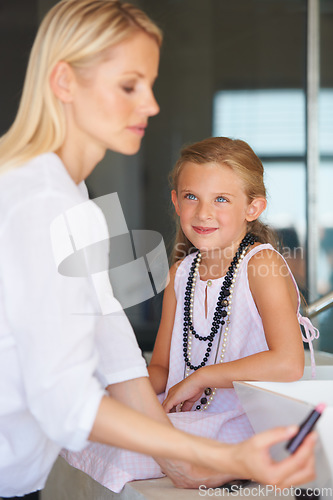 Image of Mother, child and smile for beauty, makeup and support in bathroom, lipstick and fun at home. Mom, daughter and learning or play, cosmetics and skincare or bonding, love and teaching or grooming