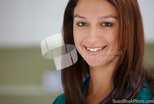 Image of Portrait, healthcare and smile with a woman vet in an animal hospital for pet insurance you can trust. Face, medical and happy young medicine professional closeup in a veterinary clinic for medicare