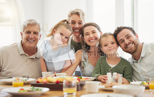 Image of Breakfast, family and portrait with parents, kid and happy grandparent together in a home. Love, support and care on a dining room with a smile and food with bonding in the morning with fruit